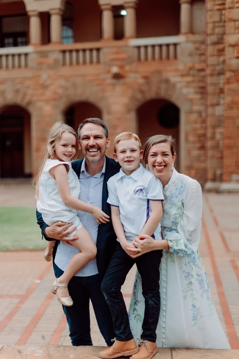 Erica house parents with their family